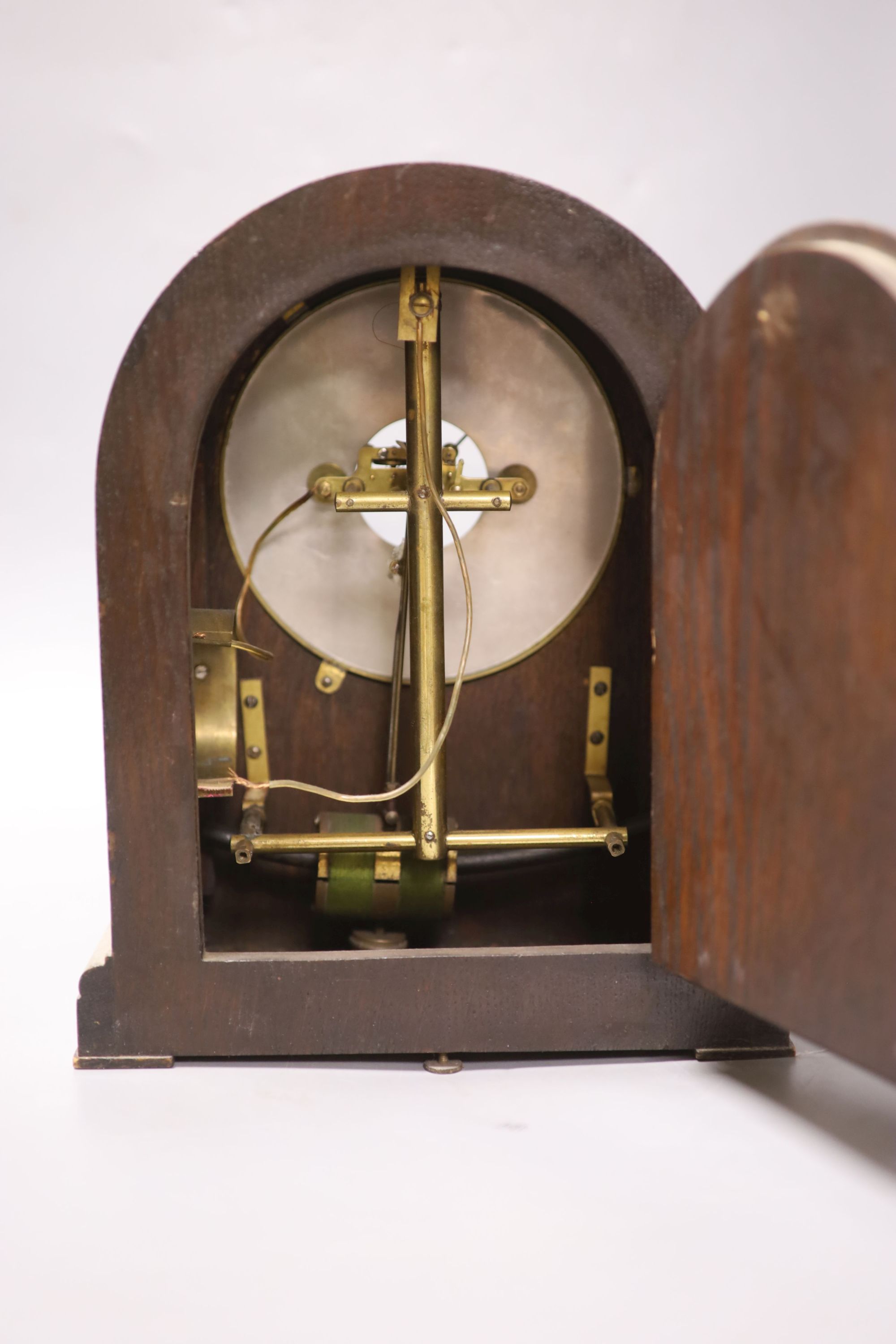 A Bulle oak cased electric mantel clock, height 29cm